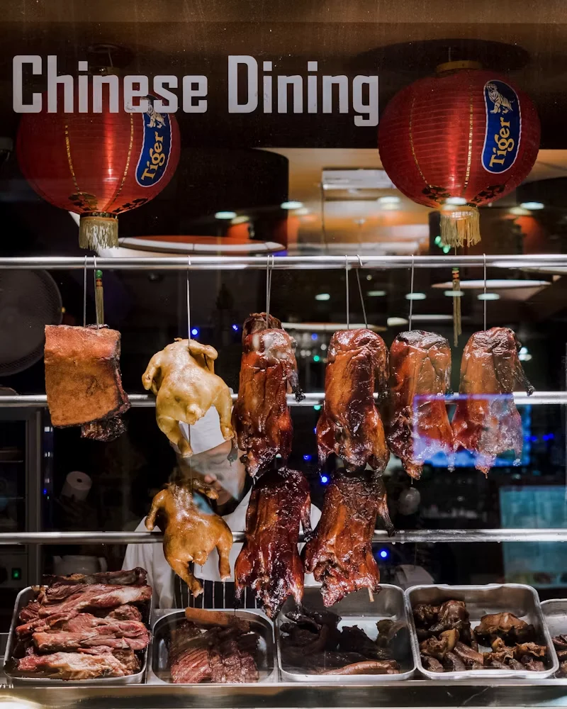 Braised ducks hanging in the Keke Food kitchen